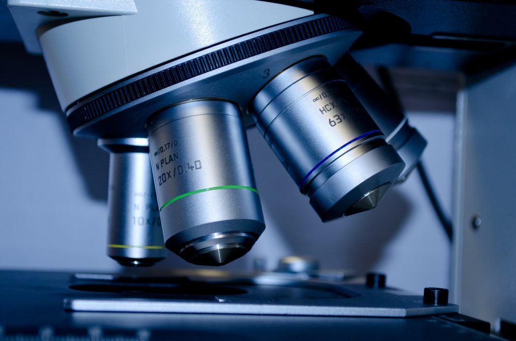 microscope-examining-sample Microscope examining a sample.