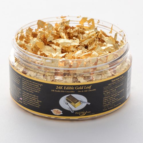 Edible gold flakes in jar container.